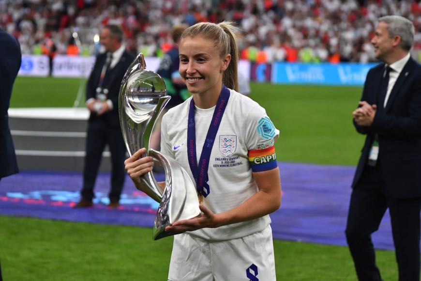Leah Williamson holding trophy